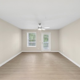 large living room with access to private balcony