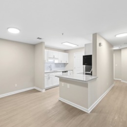 kitchen and dining area with recessed lighting