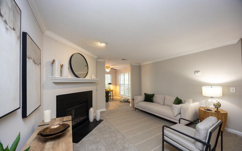 a living room with a fireplace